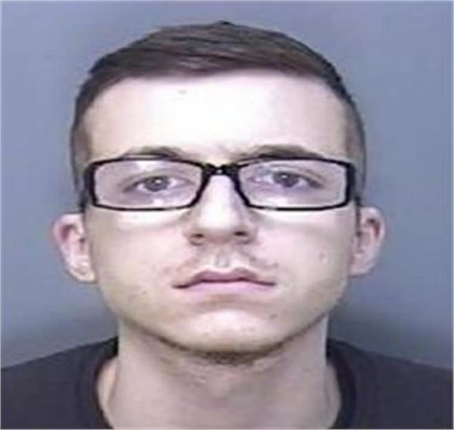 Mugshot of Aliki Mamwa.