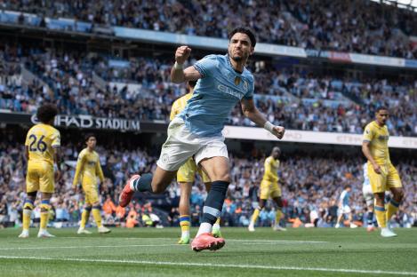 Omar Marmoush of Manchester City celebrating a goal.
