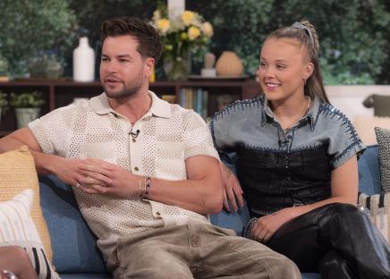 Chris Hughes and JoJo Siwa on a TV show.