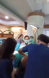 Woman giving birth during earthquake in Bangkok hospital.