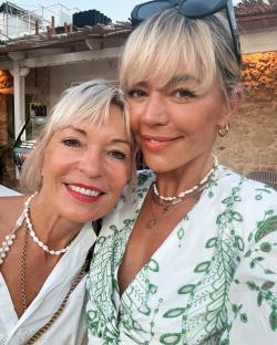 Close-up photo of Danni Menzies and her mother smiling for a selfie.