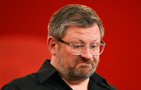 James Wade reacting during a sports competition.