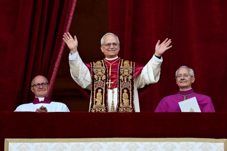 Newly elected Pope Leo XIV waves from the balcony of St. Peter's Basilica.