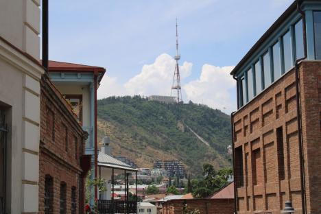 Tbilisi radio tower viewed from a city street.