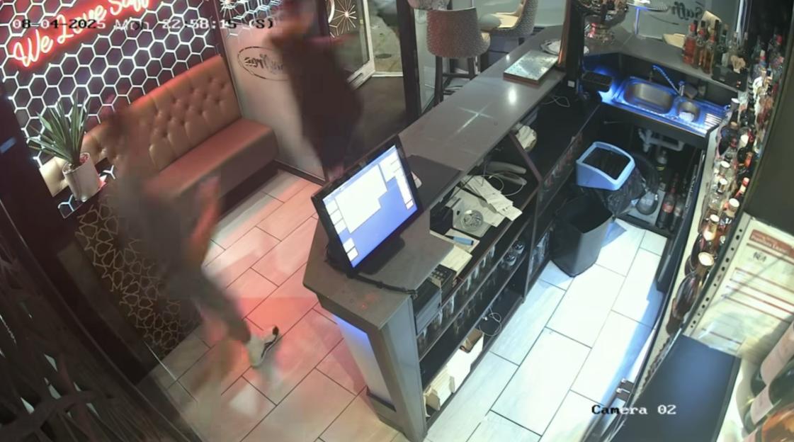 Security camera footage of dine-and-dashers leaving a restaurant.