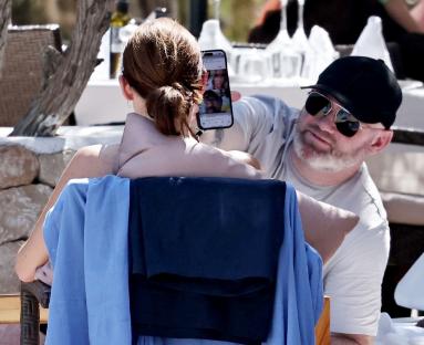 Wayne Rooney taking a selfie with his wife Coleen.
