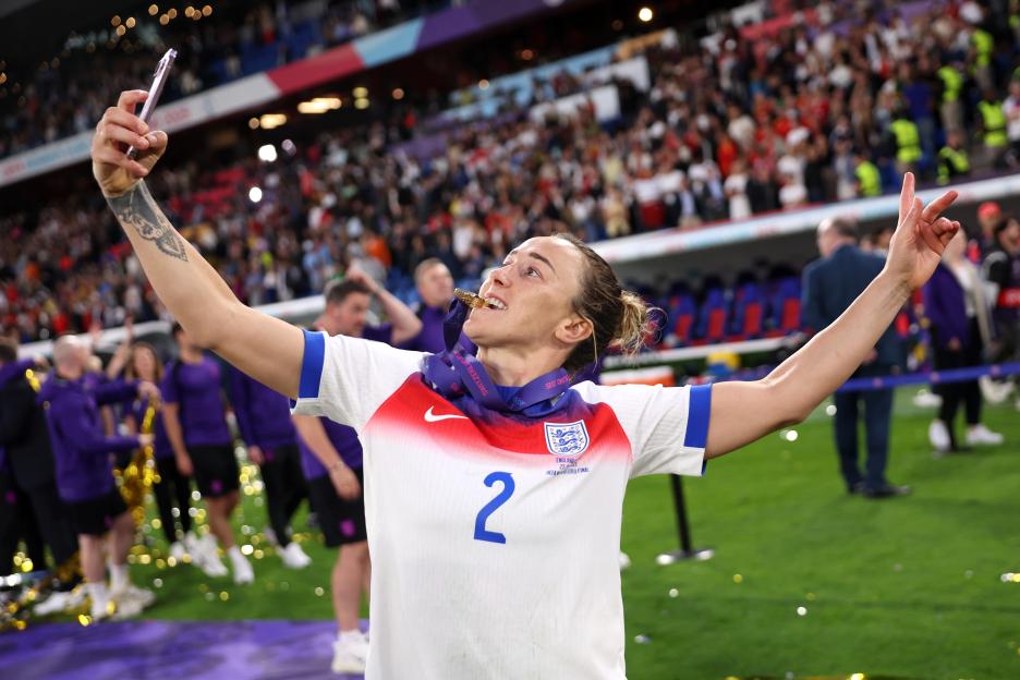 Lucy Bronze of England's women's football team takes a selfie after winning a championship.