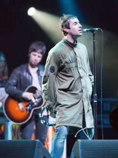 Liam Gallagher of Oasis performing live on stage.