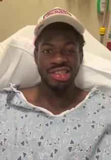 Lil Nas X in a hospital bed.