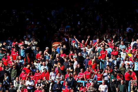 AFC Wrexham fans at a soccer match.