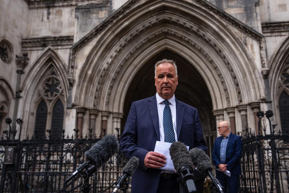 LONDON, ENGLAND - AUGUST 19: Chris Whitbread, the leader of Epping Forest District Council, speaks to the media outside the High Court on August 19, 2025 in London, England. On Tuesday the High Court granted Epping Forest District Council an interim injunction to block The Bell Hotel in Epping for use as migrant housing, forcing the occupants to be removed within 14 days. (Photo by Carl Court/Getty Images)