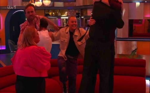 Celebrity Big Brother finalists celebrating.