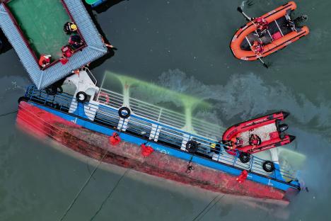 At least ten dead and dozens injured after tourist boat capsizes in China during sudden storm
