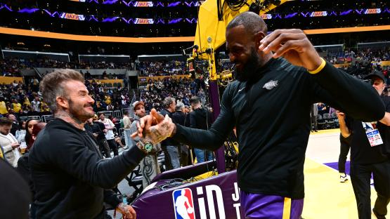 David Beckham looks up to 6ft 9in basketball star LeBron James — as 50th birthday celebrations roll on