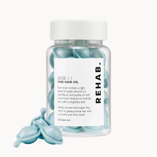 Bottle of Rehab Fine Hair Oil capsules.