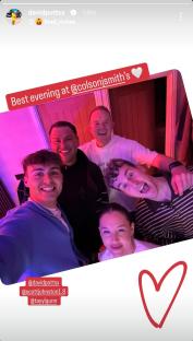 Group photo of five young adults and one young woman at a party.