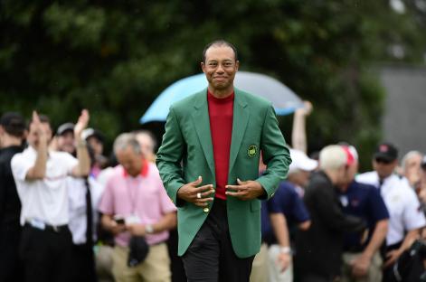 Tiger Woods in a green jacket after winning the Masters Tournament.