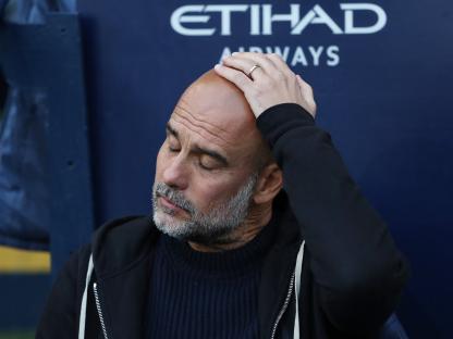 Pep Guardiola, Manchester City manager, looking pensive.