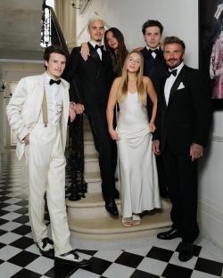 The Beckham family posing for a photo.