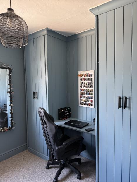 DIY wardrobe with a built-in desk and Lego minifigure display.