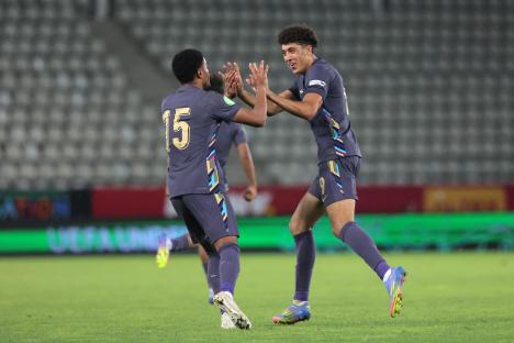England's Kadan Young and Ethan Wheatley celebrating a goal.