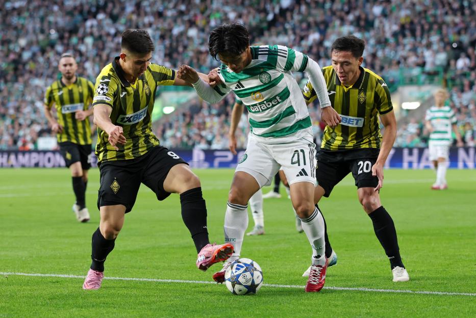 GLASGOW, SCOTLAND - AUGUST 20: Reo Hatate of Celtic is put under pressure by Dastan Satpaev and Yerkin Tapalov of Kairat Almaty during the UEFA Champions League Play-offs Round First Leg match between Celtic and Kairat Almaty at Celtic Park on August 20, 2025 in Glasgow, Scotland. (Photo by Ian MacNicol/Getty Images)