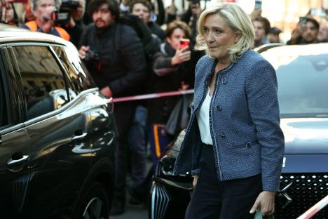 Marine Le Pen leaving her party headquarters after receiving a prison sentence.