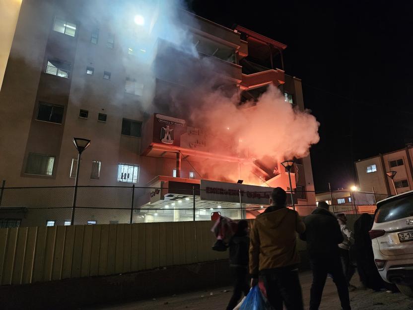 Smoke rises from the emergency department of a hospital following an attack.