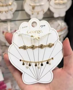 Three-piece anklet set: white beaded, gold seashell, and gold pearl. £7.00.