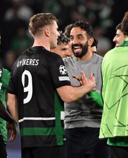 Ruben Amorim and Viktor Gyokeres celebrating after a soccer match.