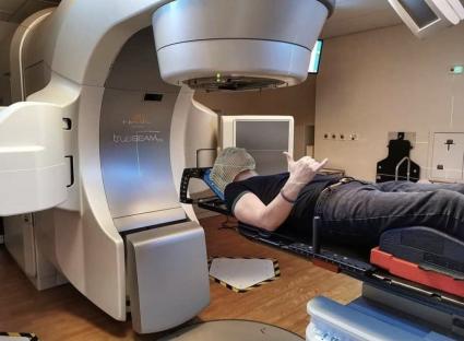 Man undergoing radiation therapy.