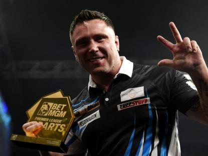 Gerwyn Price lifts the trophy following victory against Luke Humphries (not pictured) during night twelve of the BetMGM Premier League at the M&S Bank Arena, Liverpool. Picture date: Thursday April 24, 2025. PA Photo. See PA story DARTS Liverpool. Photo credit should read: Peter Byrne/PA Wire. RESTRICTIONS: Use subject to restrictions. Editorial use only, no commercial use without prior consent from rights holder.
