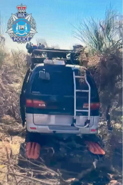 WA Police image of a vehicle stuck in bushland.