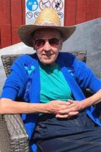 Three generations of a family posing for a photo.