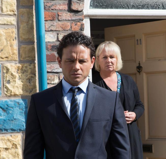 Coronation Street actors Eileen Grimshaw and Jason Grimshaw at a funeral.