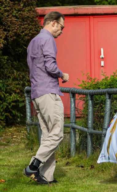 Freed Madeleine McCann suspect Brueckner seen gorging on McDonald’s and puffing cig with ankle tag on next to baby shop