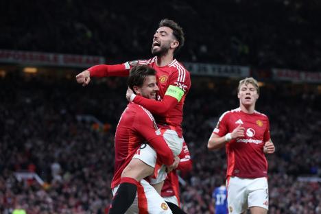 MANCHESTER, ENGLAND - MAY 08: Mason Mount of Manchester United celebrates with Bruno Fernandes after scoring their first goal during the UEFA Europa League 2024/25 Semi Final Second Leg match between Manchester United and Athletic Club at Old Trafford on May 08, 2025 in Manchester, England. (Photo by Alex Livesey - Danehouse/Getty Images)