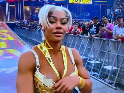 Jade Cargill adjusting her outfit at WrestleMania.