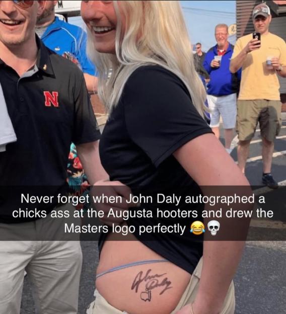 John Daly autographing a woman's buttocks with the Masters logo.