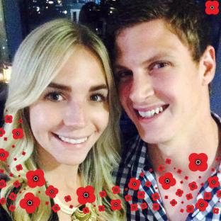 Selfie of a smiling couple with red poppies superimposed.