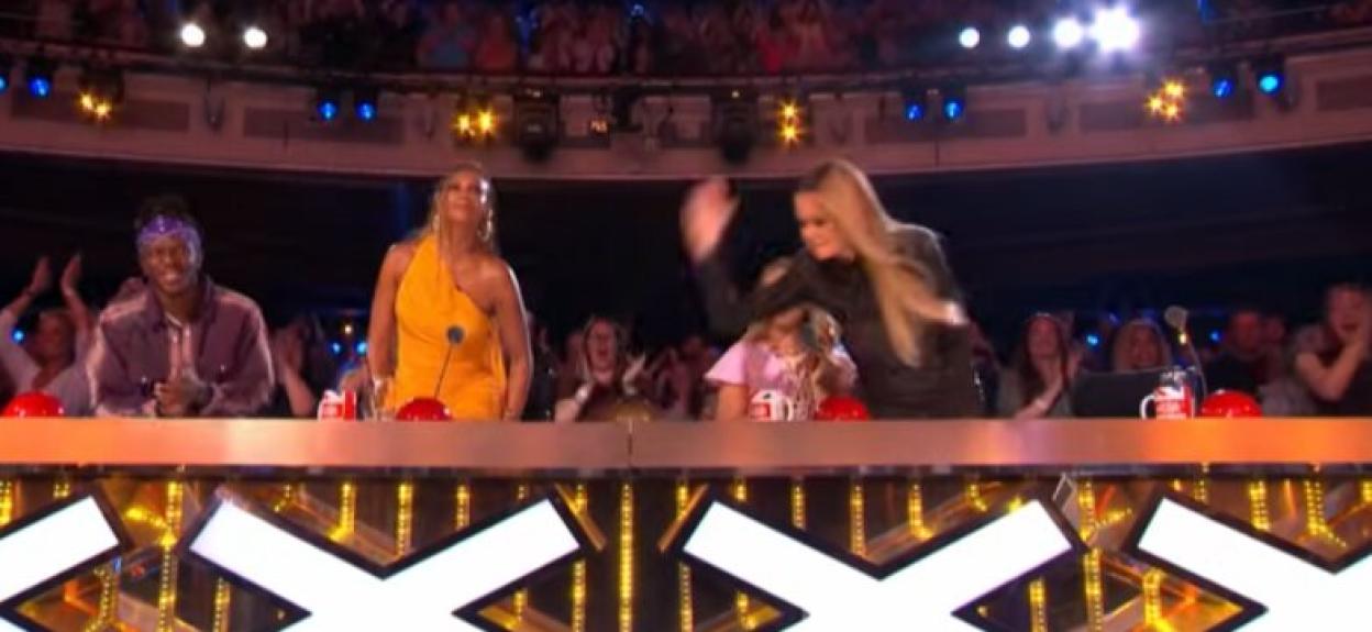 Amanda Holden hitting the Golden Buzzer on Britain's Got Talent.