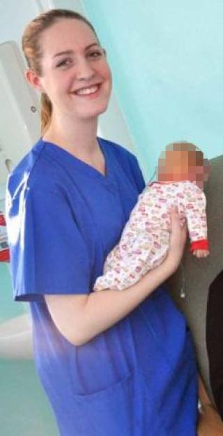 Nurse Lucy Letby holding a baby at the Countess of Chester Hospital.