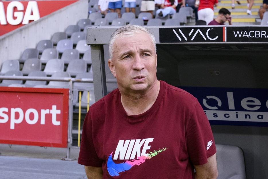 CFR Cluj Head Coach Dan Petrescu looks on.