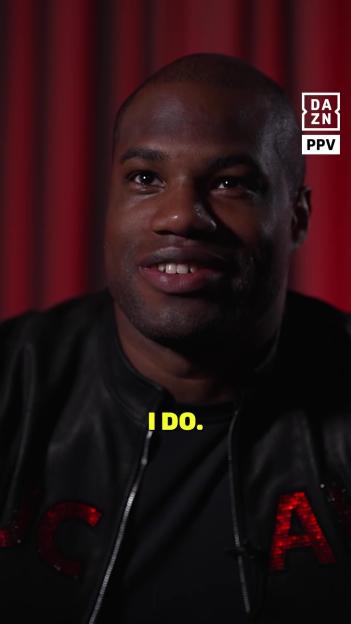 Daniel Dubois talking during an interview, with text "I DO." on his chest.