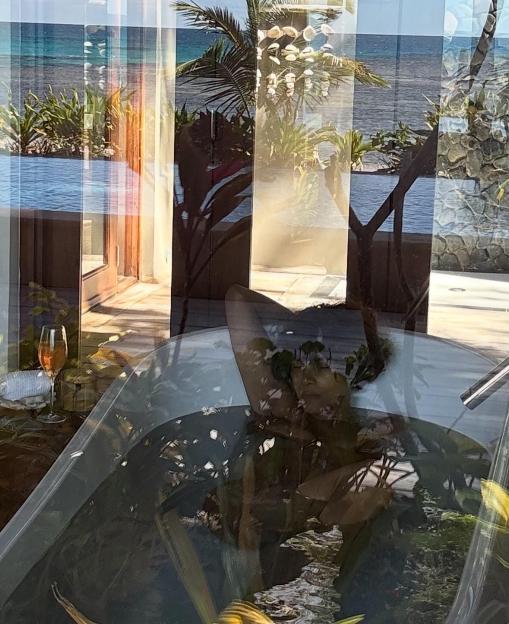 Halle Berry, 59, Enjoys a Sultry Bubble Bath After a Fun Night Out on Vacation