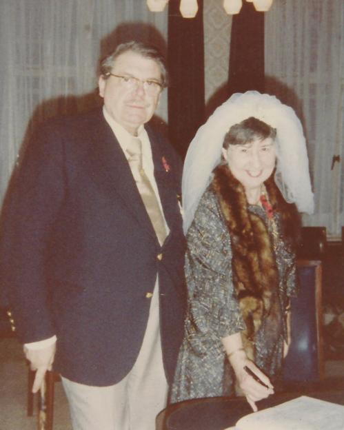 Max Wilcock and Moira Featherstone-Haugh signing documents.