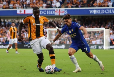 Hull star Nobel Mendy needs urgent medical attention and helped off pitch vs Chelsea after nasty clash of heads
