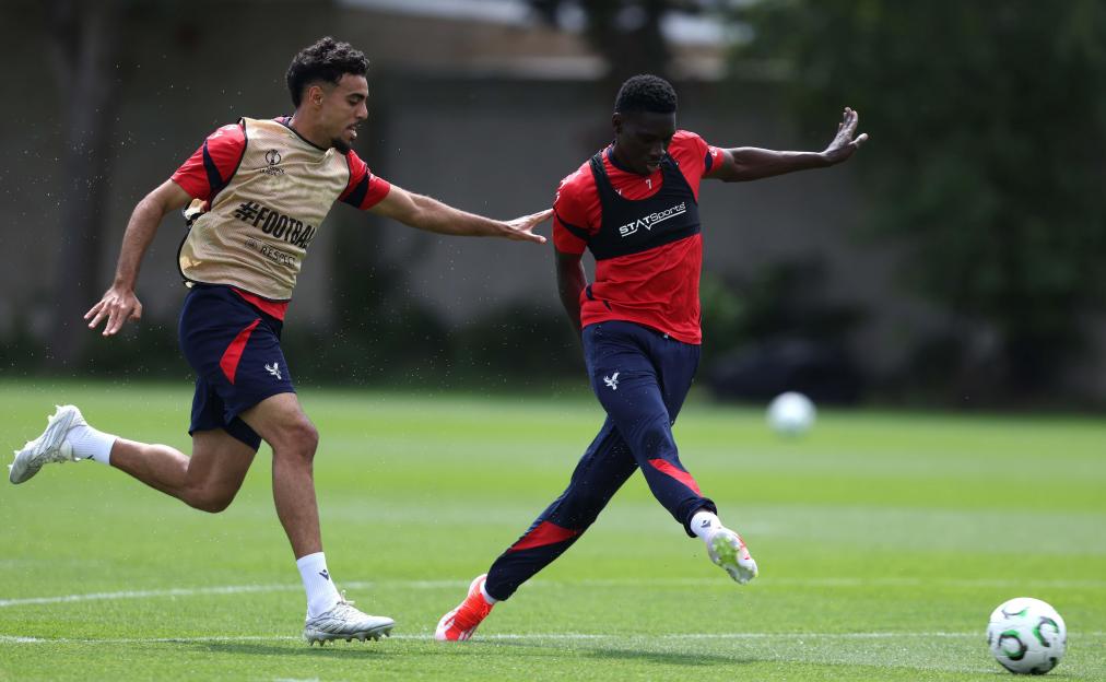 London, UK. 21st May, 2026. LONDON, ENGLAND, MAY 21: Ismaila Sarr of Crystal Palace battles for the ball with Chadi Riad of Crystal Palace during the Crystal Palace FC UEFA Conference League Final Media Open Day at Crystal Palace FC Training Ground,