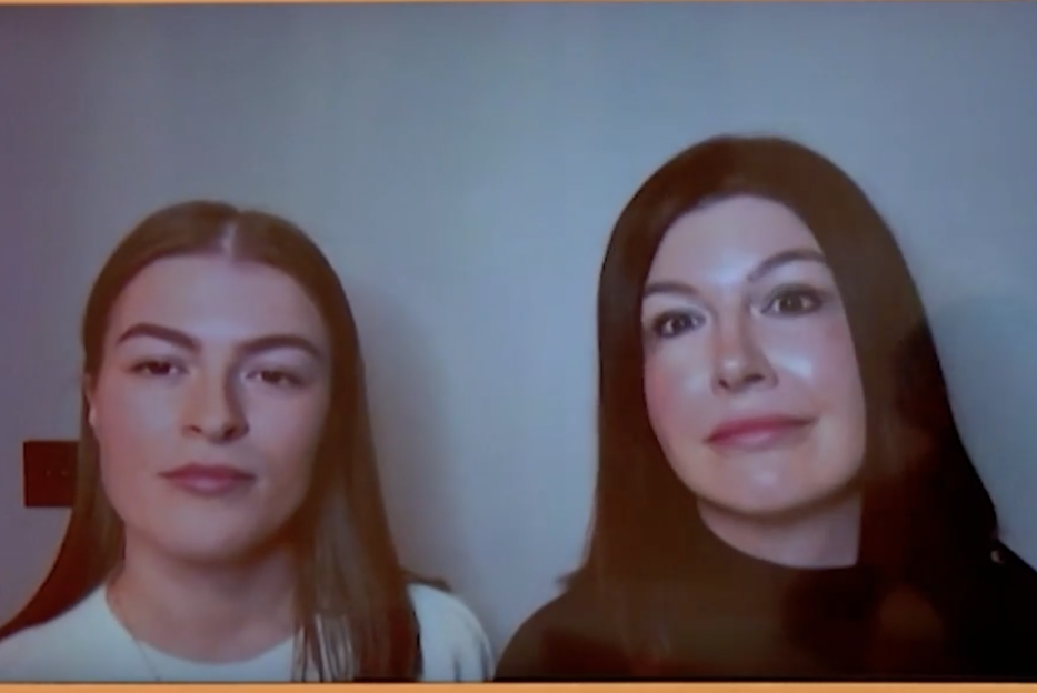 Two women, one with long dark hair and one with shoulder-length light brown hair, pose for a photo.