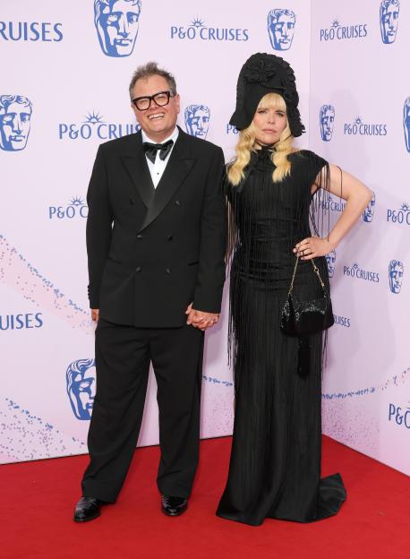 Alan Carr and Paloma Faith attend the 2026 BAFTA Television Awards.